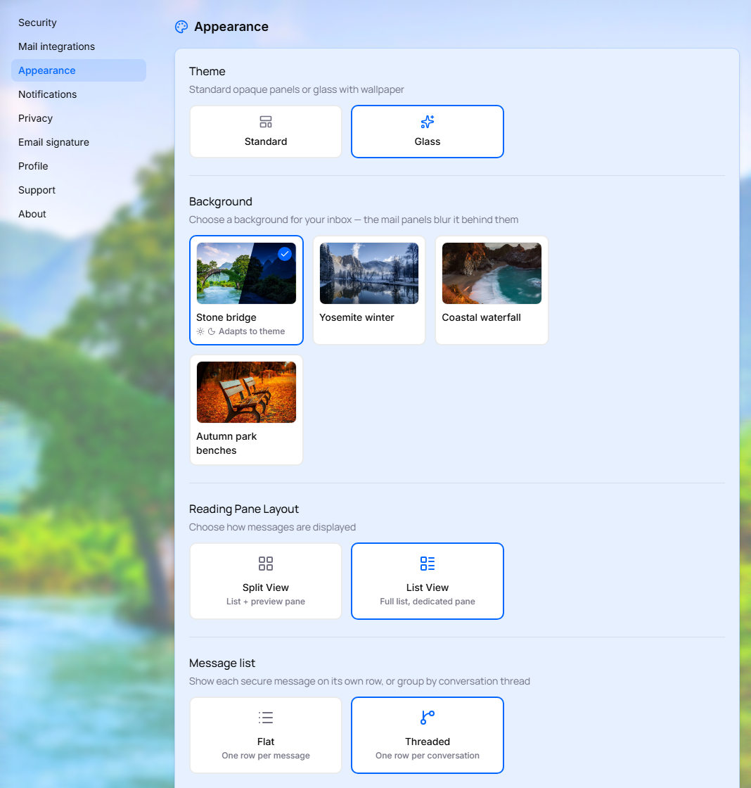 Settings page, Appearance section, with the Glass theme selected and background pictures showing